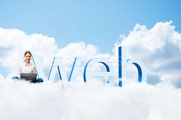 girl sitting cross-legged on the clouds Stock photo © adam121