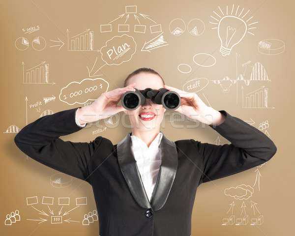 business woman looking through binoculars Stock photo © adam121