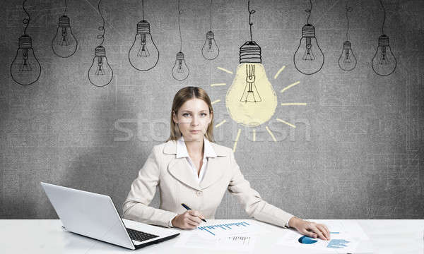 Businesswoman in process of creative work Stock photo © adam121