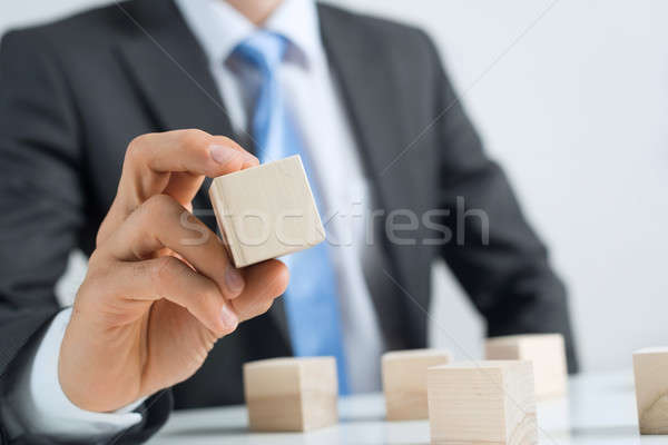 Businessman making tower Stock photo © adam121