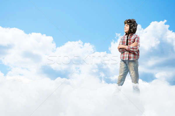 Stock photo: Boy in helmet pilot dreaming of becoming a pilot