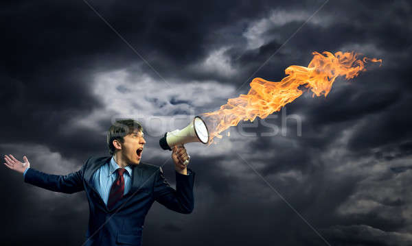 Om de afaceri megafon agresiune afaceri vorbitor Imagine de stoc © adam121