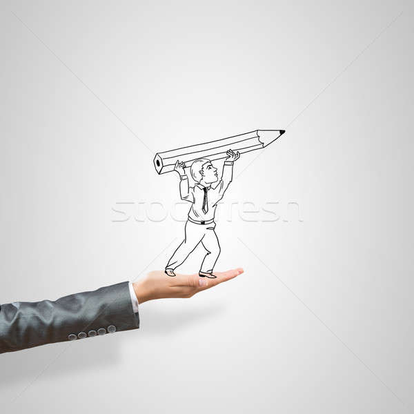 Caricatures of businessman in palm Stock photo © adam121
