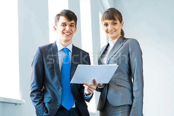 two business partners discussing reports Stock photo © adam121