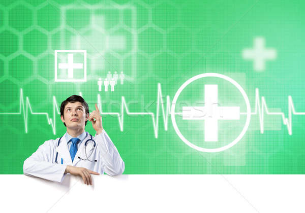 Doctor with banner Stock photo © adam121