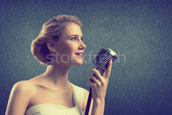 Vonzó nő énekes mikrofon grunge stílus divat Stock fotó © adam121