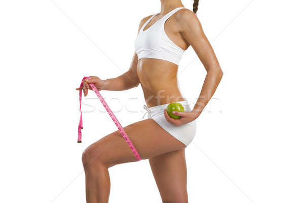 young athletic woman with measuring tape Stock photo © adam121