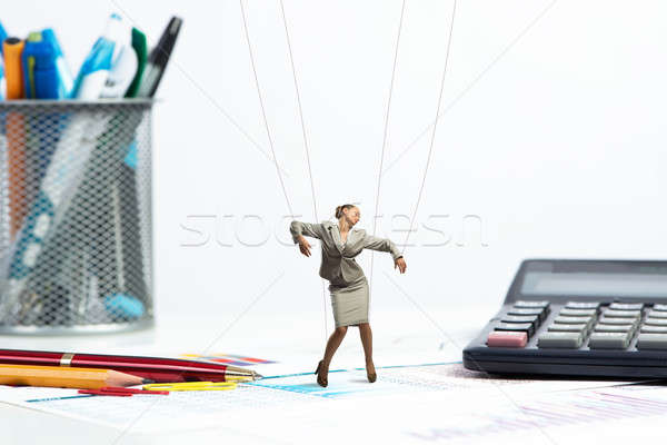 businesswoman puppet doll is on the desk Stock photo © adam121