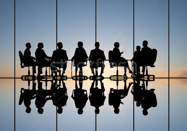 üzleti megbeszélés sziluettek csoport üzletemberek naplemente nők Stock fotó © adam121
