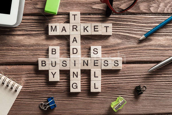Stock photo: Conceptual business keywords on table with elements of game making crossword