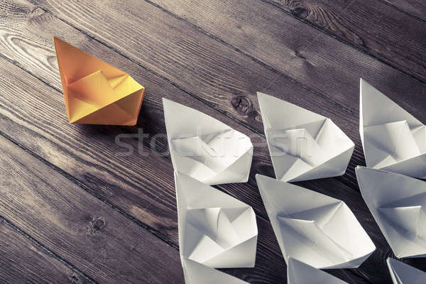 Business leadership concept with white and color paper boats on  Stock photo © adam121