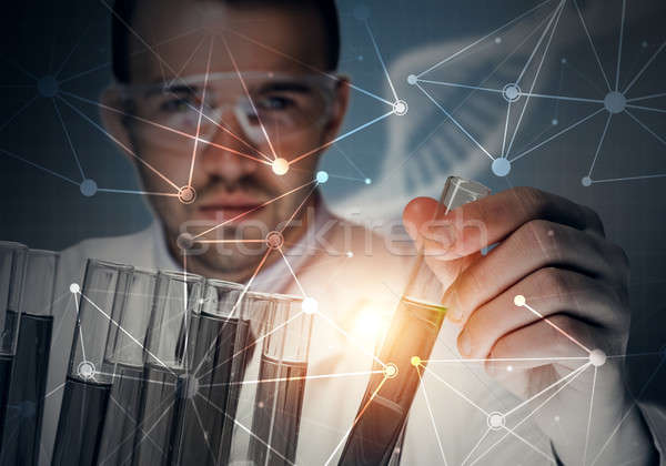 Portrait of concentrated male scientist working with reagents in laboratory Stock photo © adam121