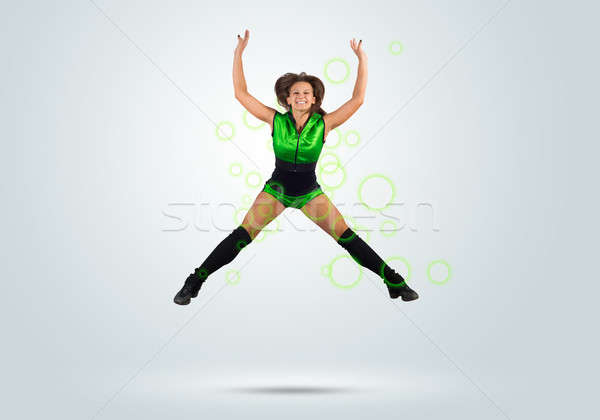 Majoreta fată tineri frumos jumping Imagine de stoc © adam121