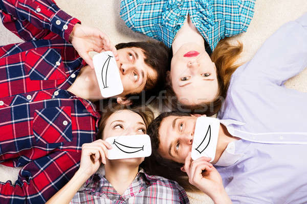 four young men lie together Stock photo © adam121