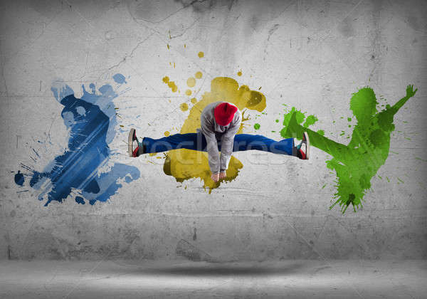 Hip hop danser jonge springen silhouetten grijs Stockfoto © adam121