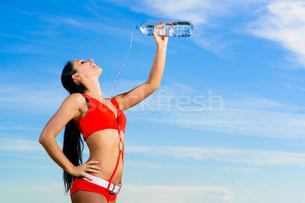 Deporte nina rojo uniforme botella agua Foto stock © adam121