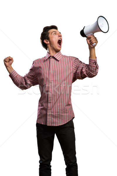 Portrait of a young man shouting using megaphone Stock photo © adam121