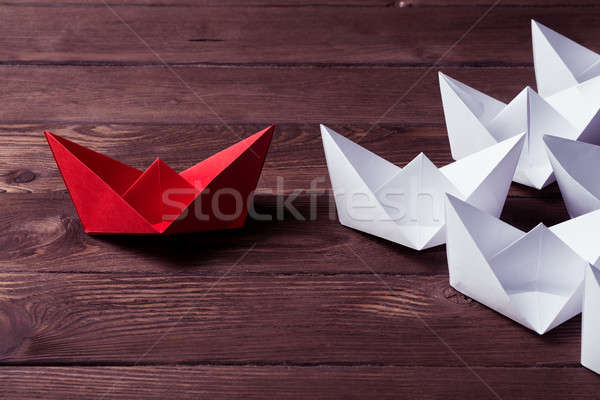 Business leadership concept with white and color paper boats on  Stock photo © adam121