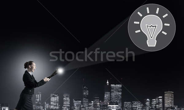 Woman with lantern in hand Stock photo © adam121