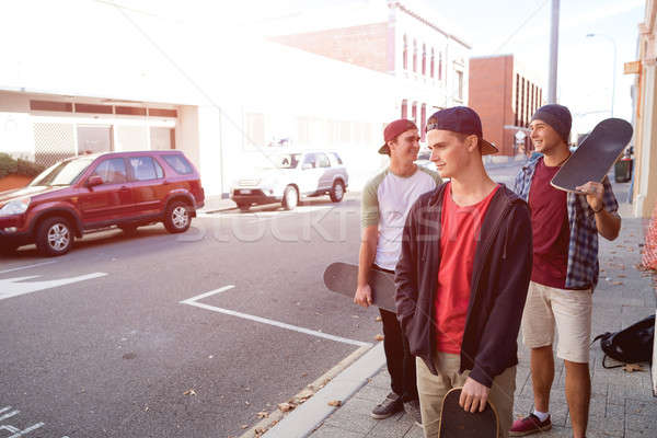 Guys skateboarders in street Stock photo © adam121