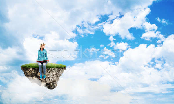 Pretty girl with red book Stock photo © adam121