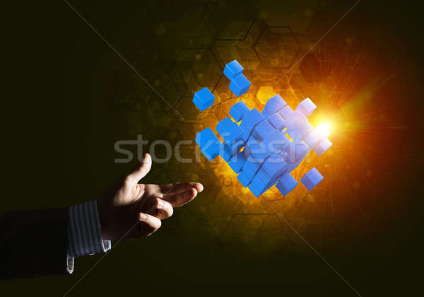 Stock photo: Idea of new technologies and integration presented by cube figure