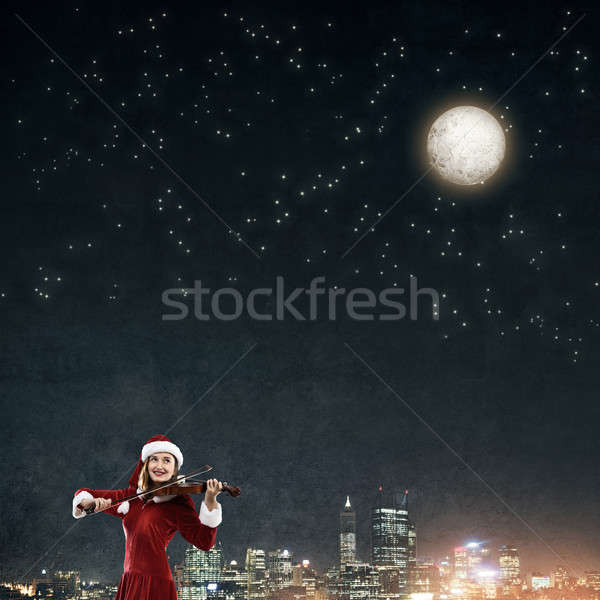 Dallam karácsony vonzó fiatal nő mikulás öltöny Stock fotó © adam121