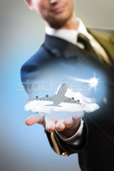 pilot in the form of extending a hand to airplane Stock photo © adam121