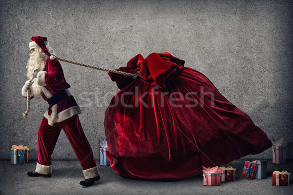 Papá noel enorme bolsa regalos alrededor cajas Foto stock © adam121