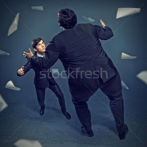 Stock photo: two businessmen fighting as sumoist