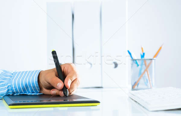 close-up of a man's hand with a pen stylus Stock photo © adam121