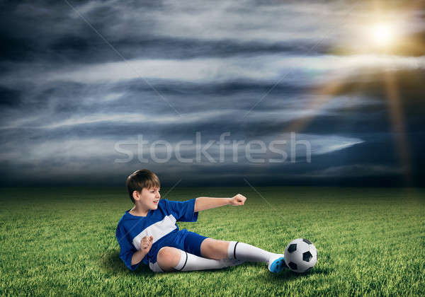Jonge voetbal kampioen opgewonden jongen voetballer Stockfoto © adam121