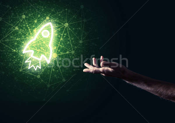Man palm presenting Rocket web icon as technology concept Stock photo © adam121