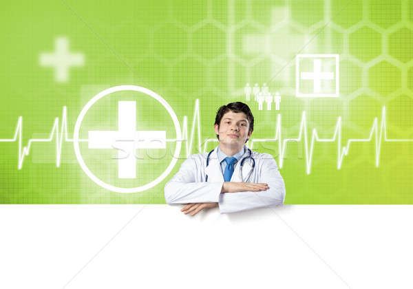 Doctor with banner Stock photo © adam121