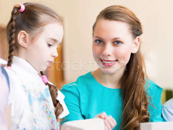 teacher talks to a schoolgirl Stock photo © adam121