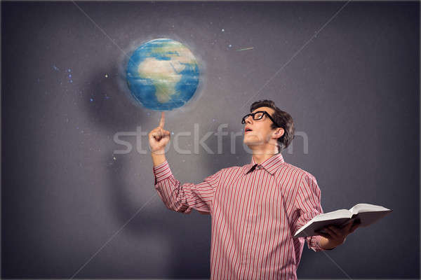young man with a book thinks Stock photo © adam121