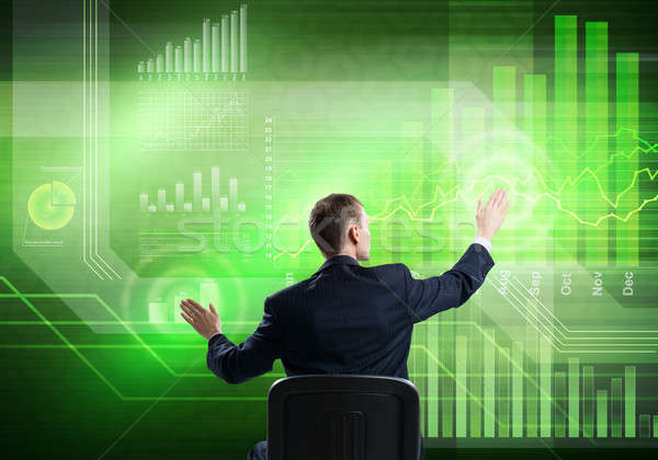 Businessman using media interface Stock photo © adam121