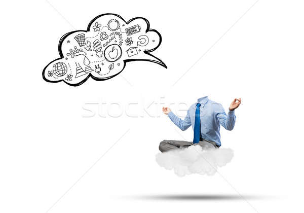 Headless businessman meditating Stock photo © adam121