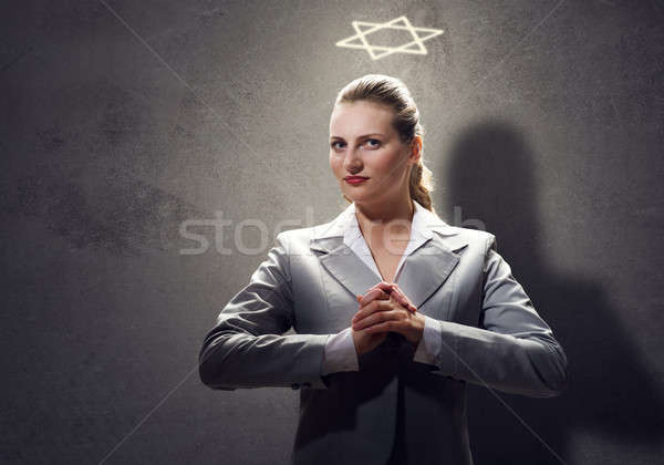 Praying businesswoman Stock photo © adam121