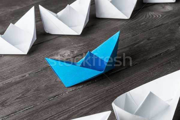 Business leadership concept with white and color paper boats on  Stock photo © adam121