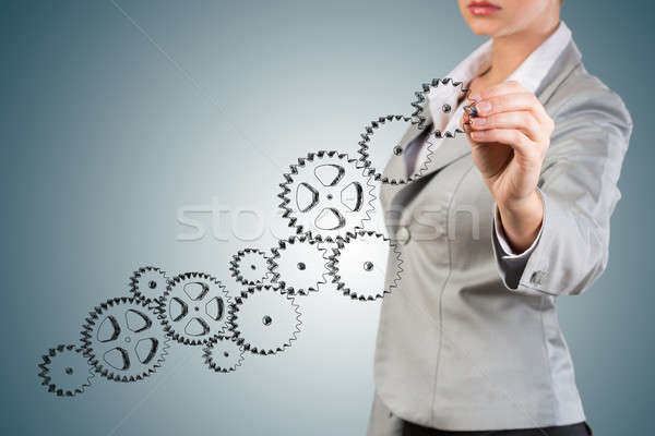 Mujer de negocios dibujo boceto mecanismo exitoso Foto stock © adam121