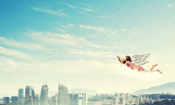 Genç ücretsiz güzel kadın uçan gökyüzü oynama Stok fotoğraf © adam121
