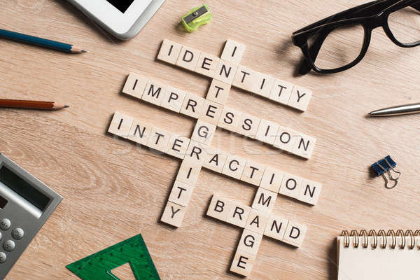 Stock photo: Conceptual business keywords on table with elements of game making crossword