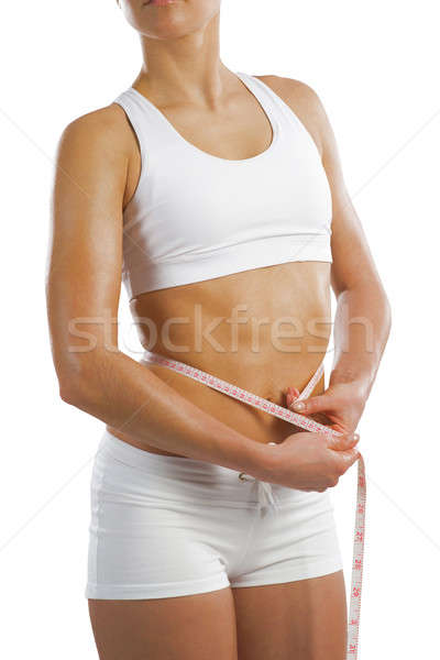 young athletic woman measuring waist Stock photo © adam121