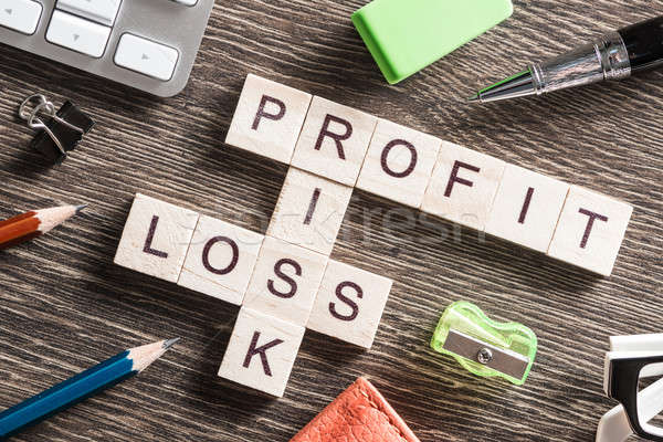 Conceptual business keywords on table with elements of game making crossword Stock photo © adam121