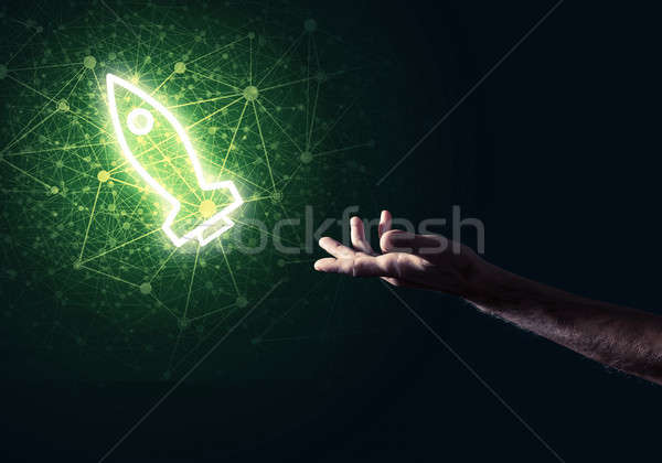 Man palm presenting Rocket web icon as technology concept Stock photo © adam121