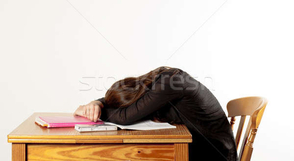 Fille paresseux dormir étudier tête table Photo stock © advanbrunschot
