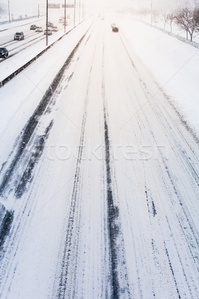 Disturbing Sunset Light and Snowstorm on Highway Stock photo © aetb