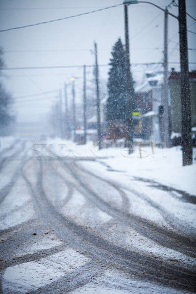 Snow-covered road, the marks of wheels
 Stock photo © aetb
