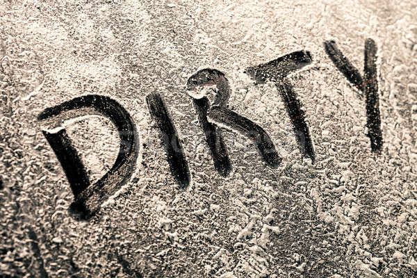 Dirty Word on a Window Full of Dirt Stock photo © aetb
